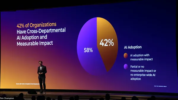 Info-Tech Research Group CEO Tom Zehren speaks in front of a screen during the company's conference keynote on June 9, 2026.