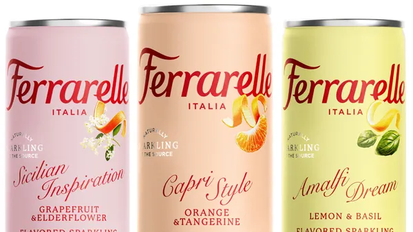 Three cans of flavored sparkling water.