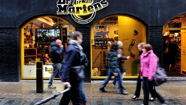 A view of a Dr. Martens store as people pass by.