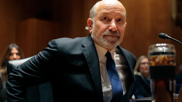 U.S. Secretary of Commerce Howard Lutnick sits before testifying befoe a Senate subcommittee.