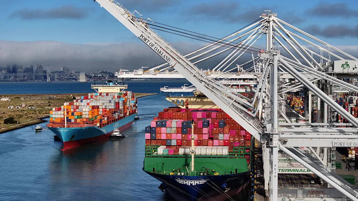 In an aerial view, a container ship arrives at the Port of Oakland on August 01, 2025 in Oakland, California.