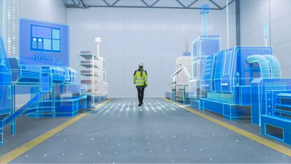 Engineer walks through factory workshop with augmented reality 3D models CNC machinery production line