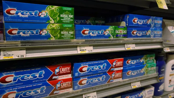 Boxes of Crest toothpaste owned by the Procter & Gamble sit on a store shelf.