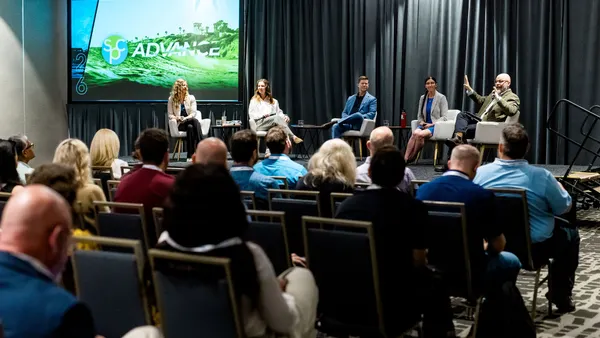 Panelists on stage at SPC Advance 2026