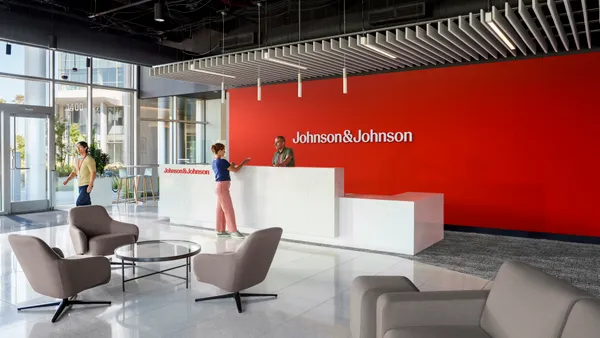 Johnson & Johnson's new logo is seen on an office lobby wall.