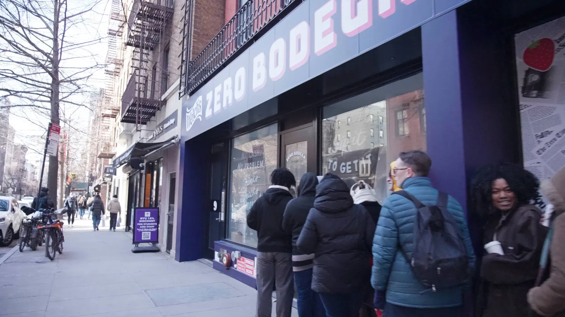 A line of people form outside of Welch's Zero Bodega pop-up experience in New York City