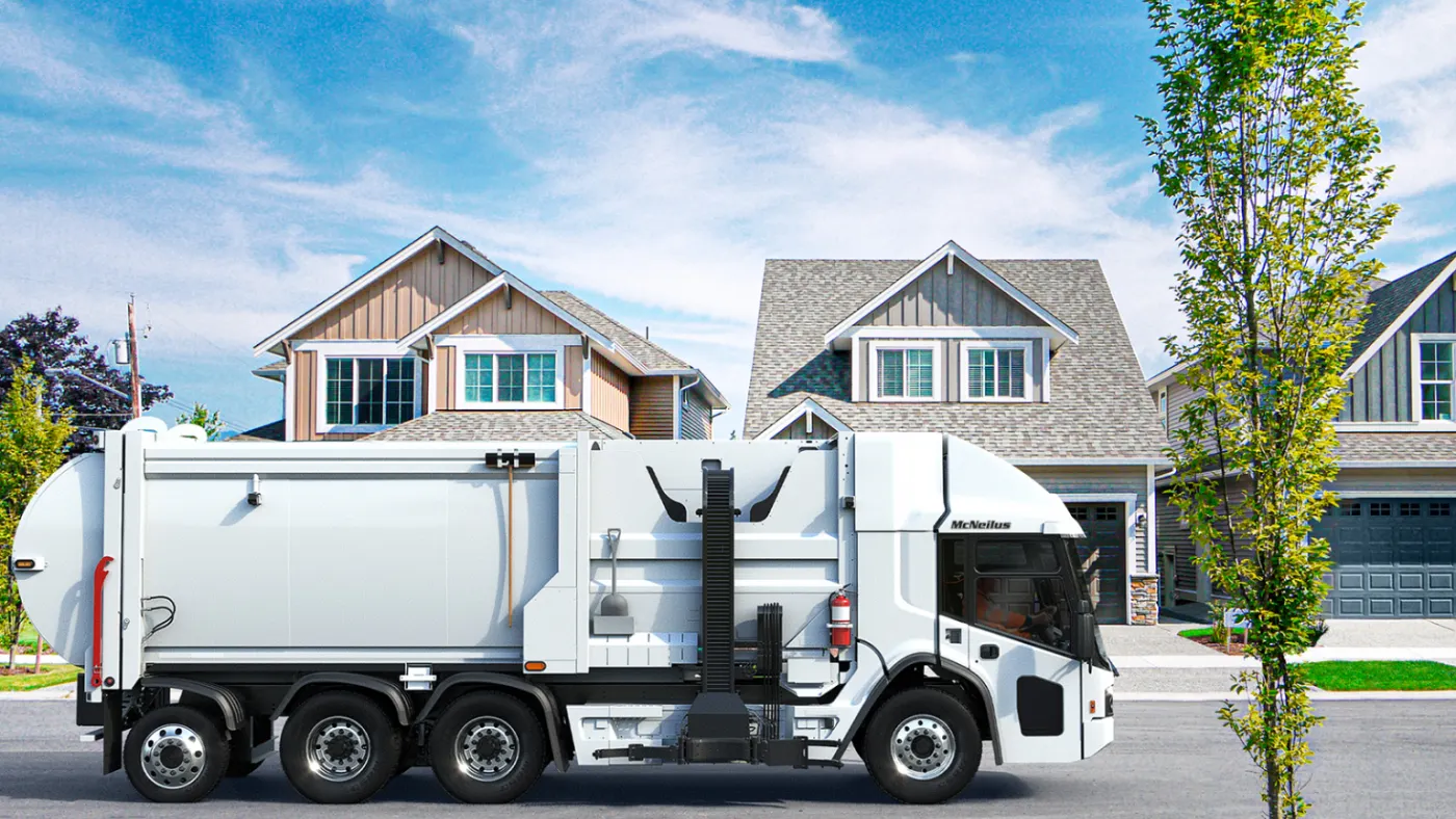 A trash truck on a residential street