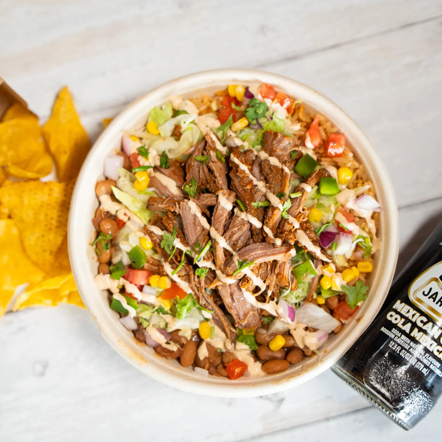 Burritobar&#x27;s barbacoa bowl. Slow cooked, pulled beef on top of a variety of Tex-Mex ingredients.