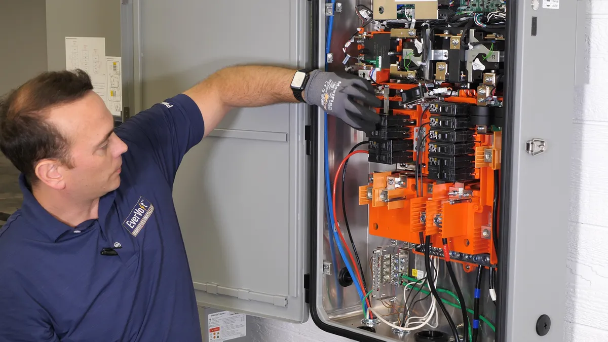 A tech installs the Panasonic Smart Box.