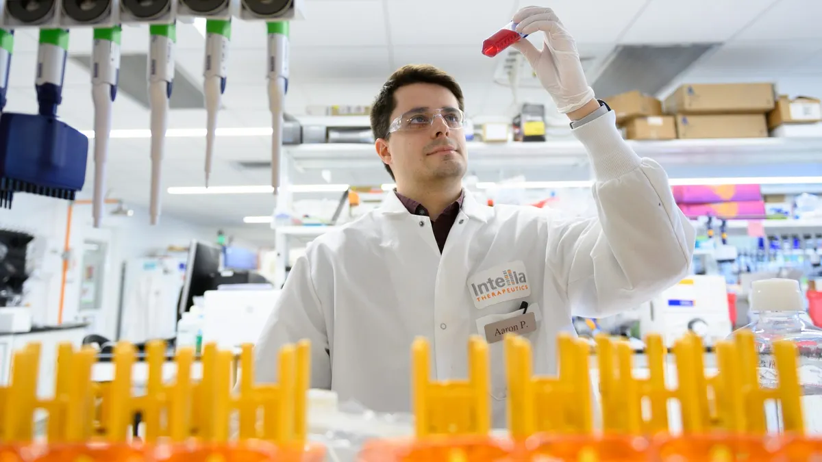 A photograph of Intellia scientists in the lab