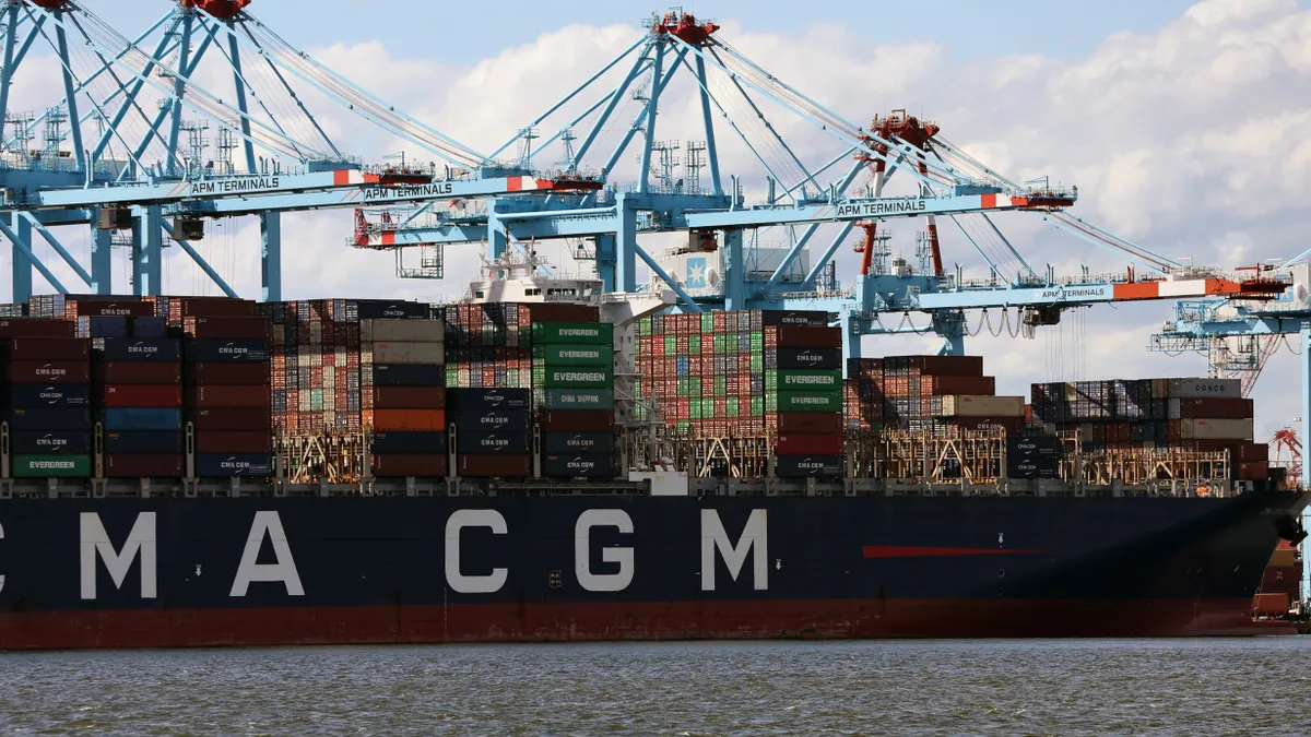 Shipping containers sit stacked in a port on June 9 in Bayonne, New Jersey.