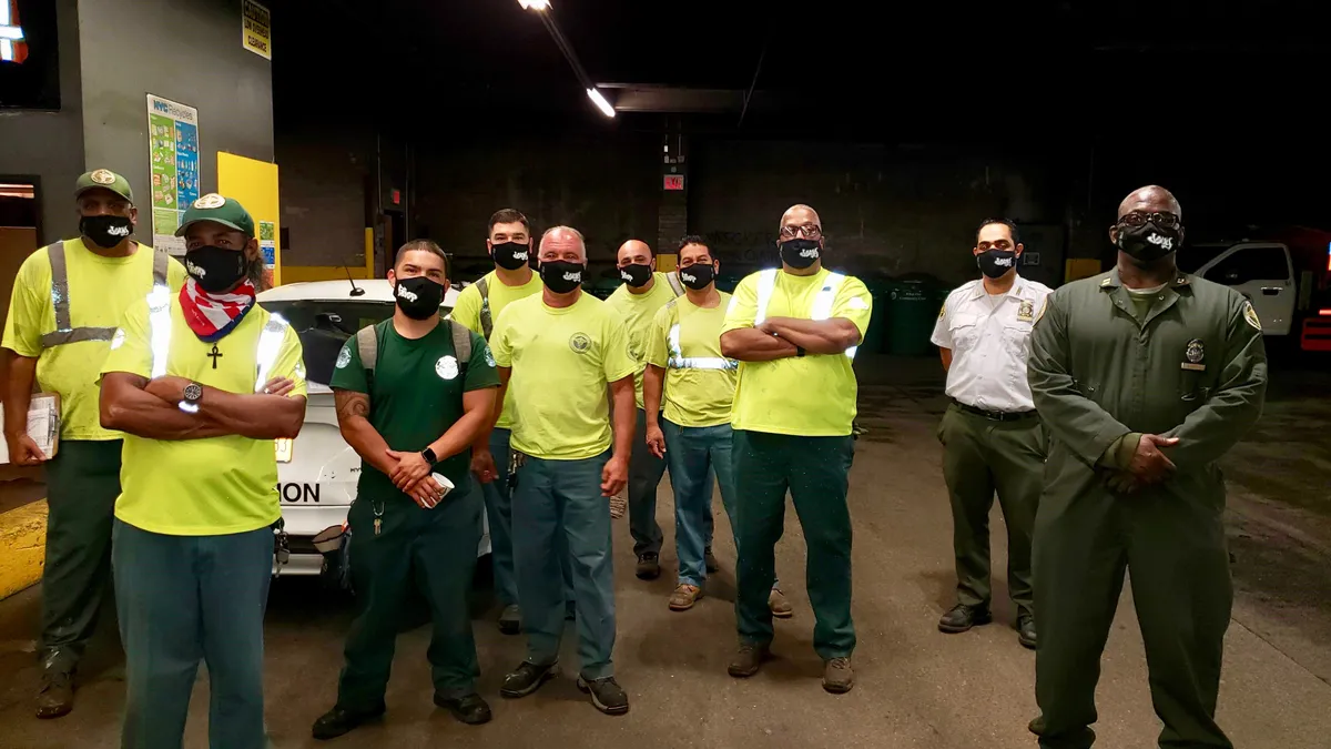 DSNY workers with masks from the Sanitation Foundation