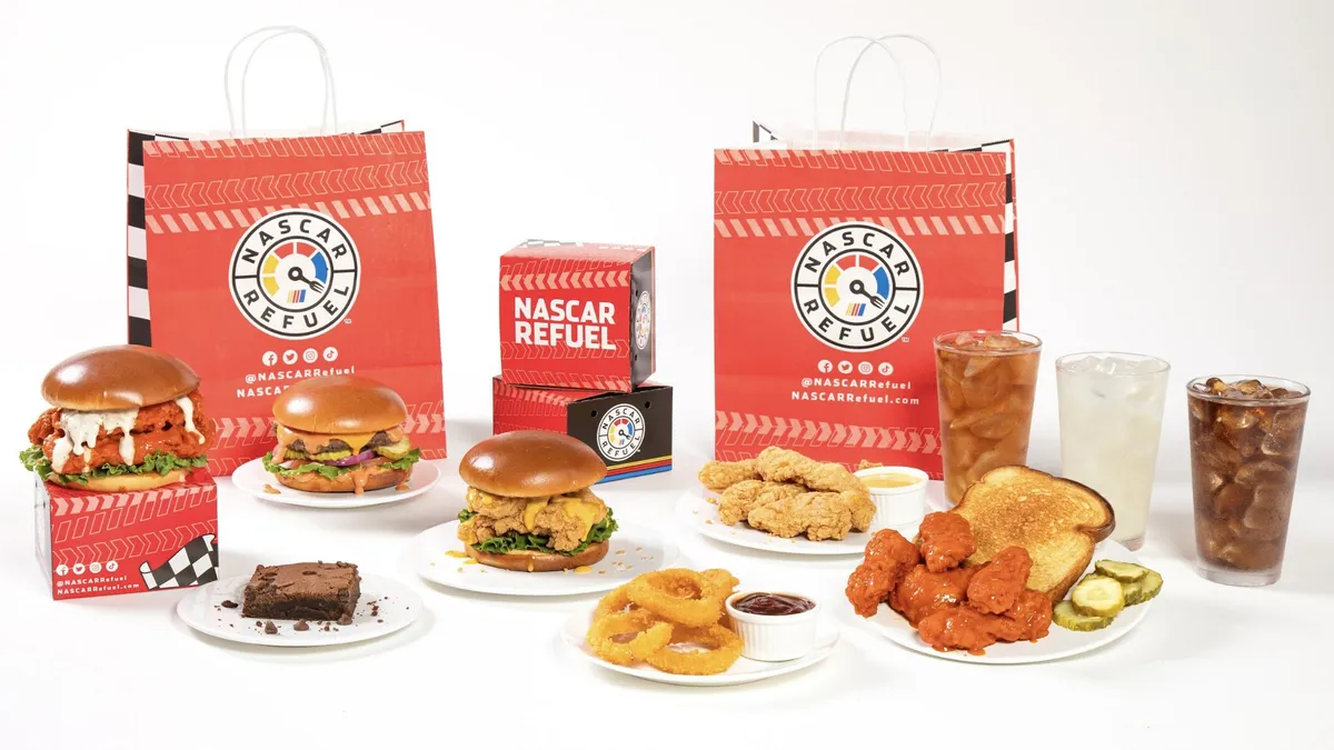 A photograph of packaging and menu items for IHOP/Virtual Dining Concepts' new NASCAR themed brand