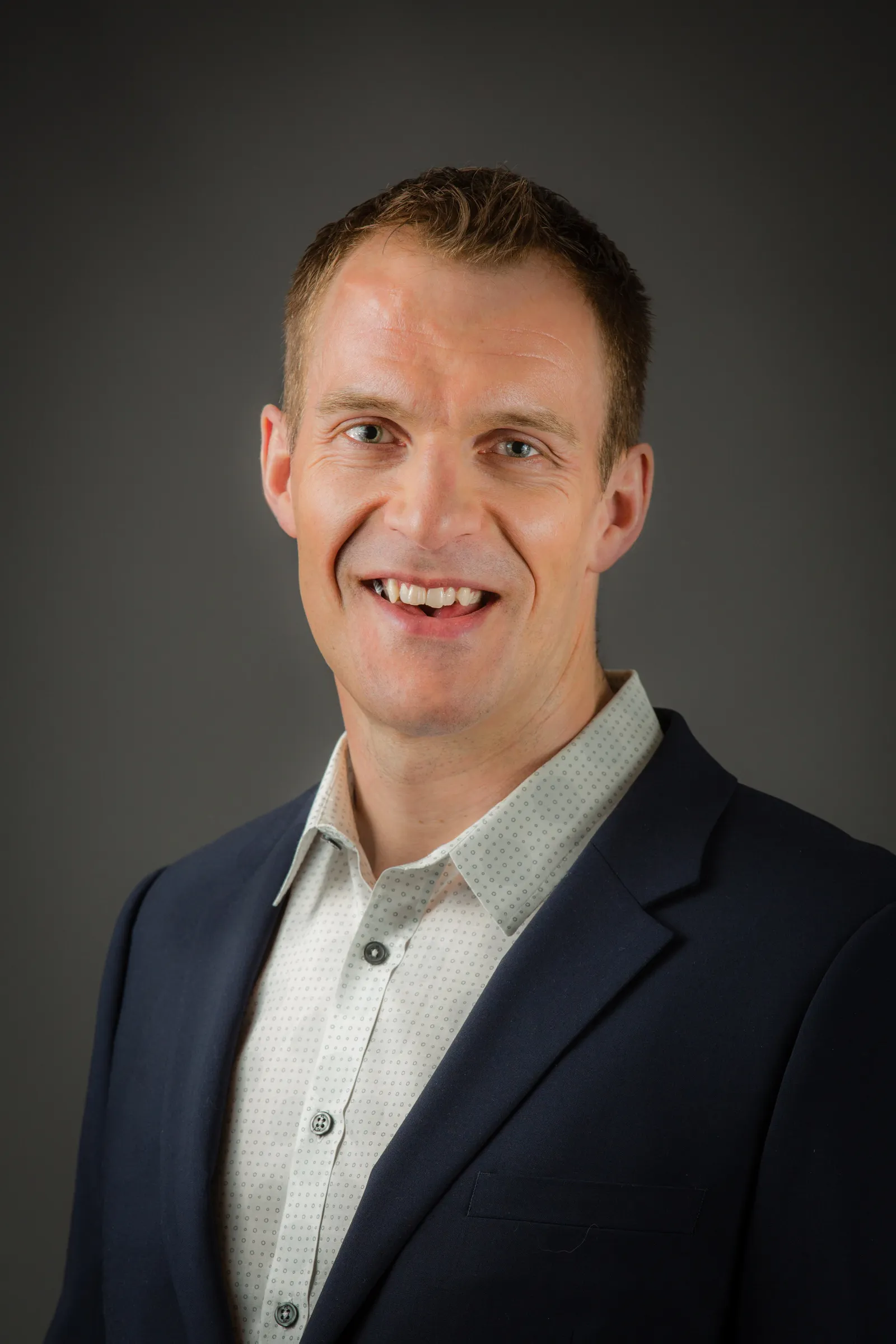 A headshot of Welch's Chief Brand and Innovation Officer Andrew Hartshorn