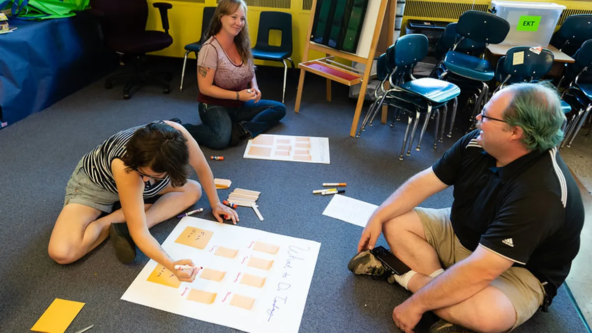 Parents work on transition activities in the Early Learning Transition program in the Portland Public Schools