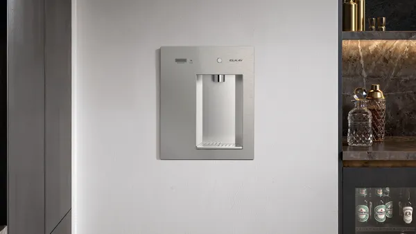 A water filter built into a wall.