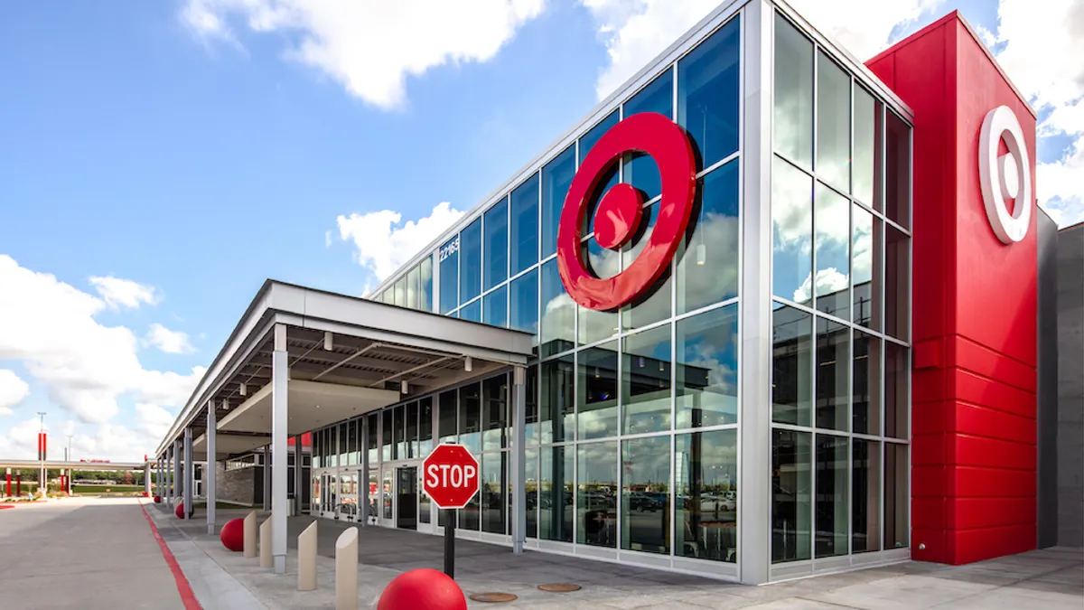 The exterior of a new Target store featuring the company's new design includes large glass panels and the company's red bullseye logo