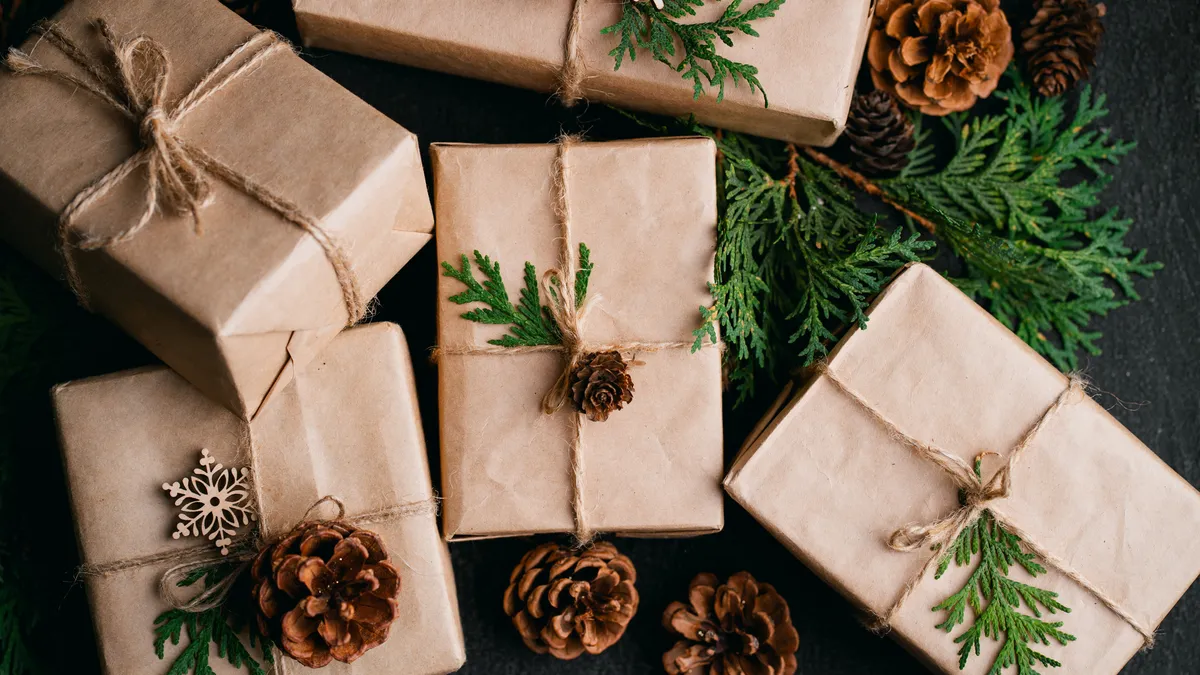 Brown paper wrapped gifts with string ties.