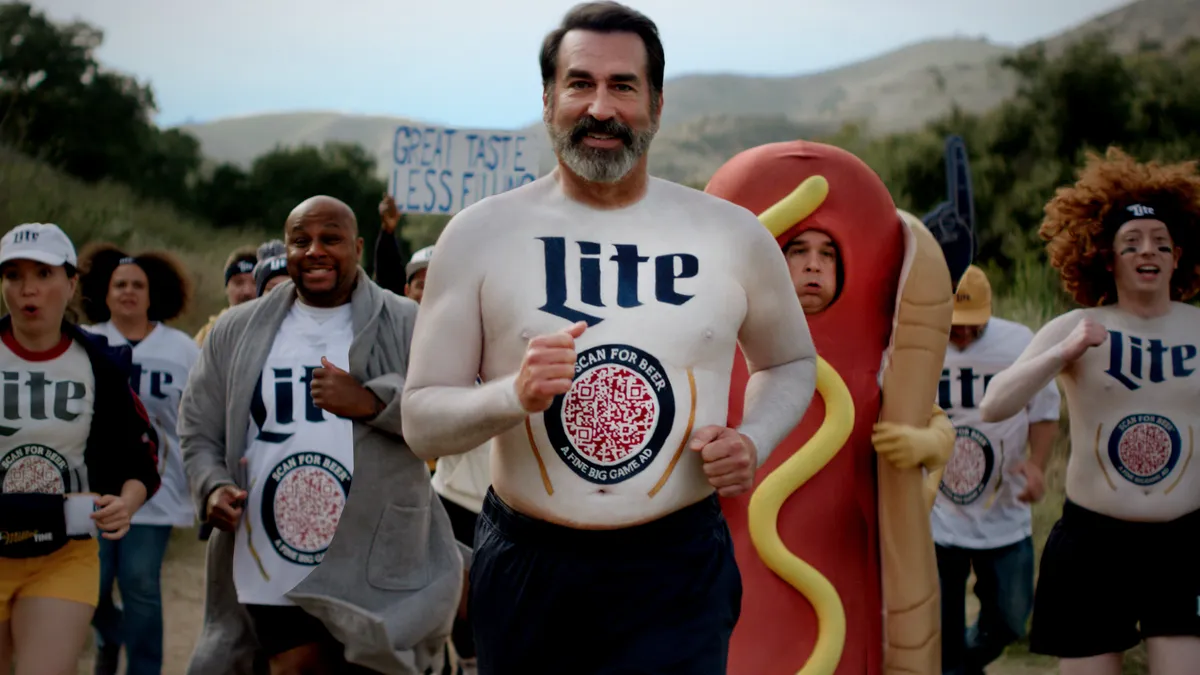 A group of people run in the wilderness wearing Miller Lite gear.