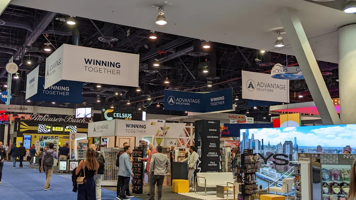 Show floor at NACS 2022 with Anheuser-Busch and Celsius signs