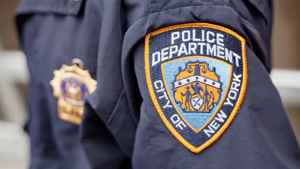 NYPD crest on the jacket of a New York City police officer