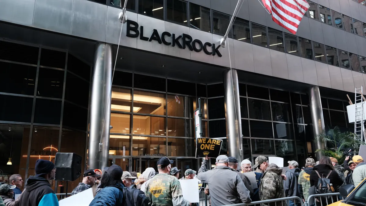 Protesters seen outside BlackRock's Manhattan headquarters.