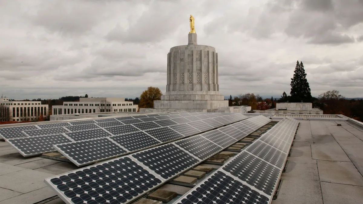 Solar panels are mounted on the west wing roof of the Oregon State Capitol.