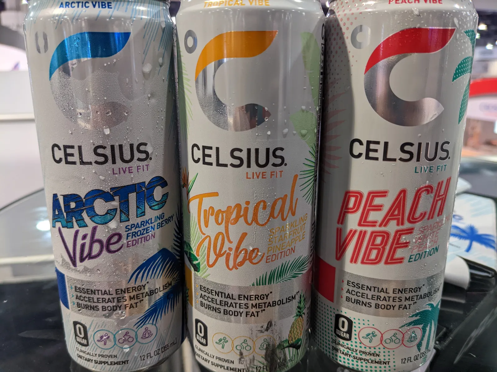 Three different flavored cans of Celsius Vibe