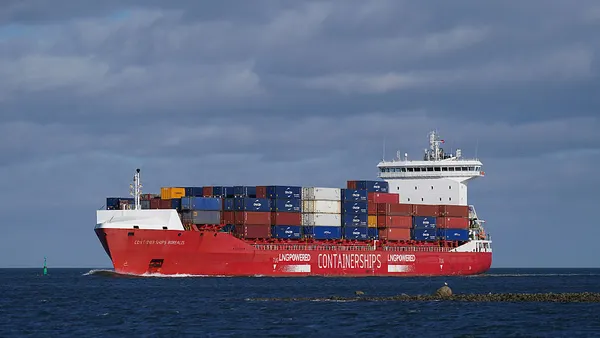 A container ship in the ocean in England.
