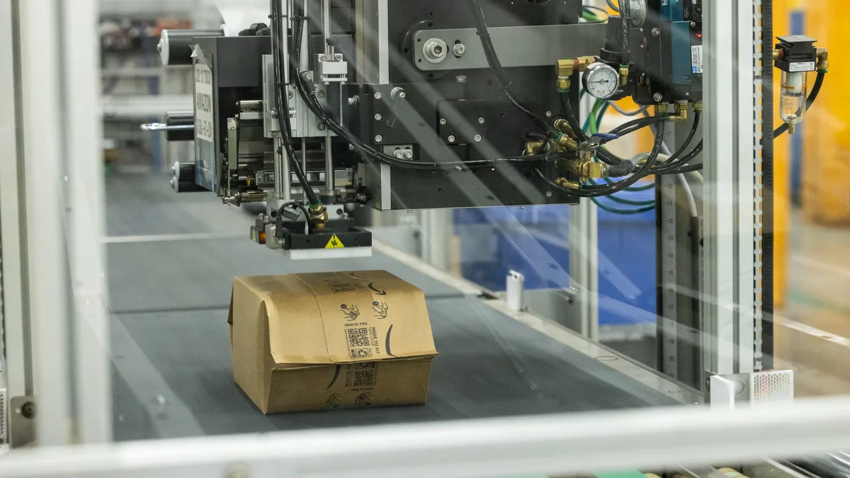 A flexible fiber package on a conveyor at a fulfillment center.