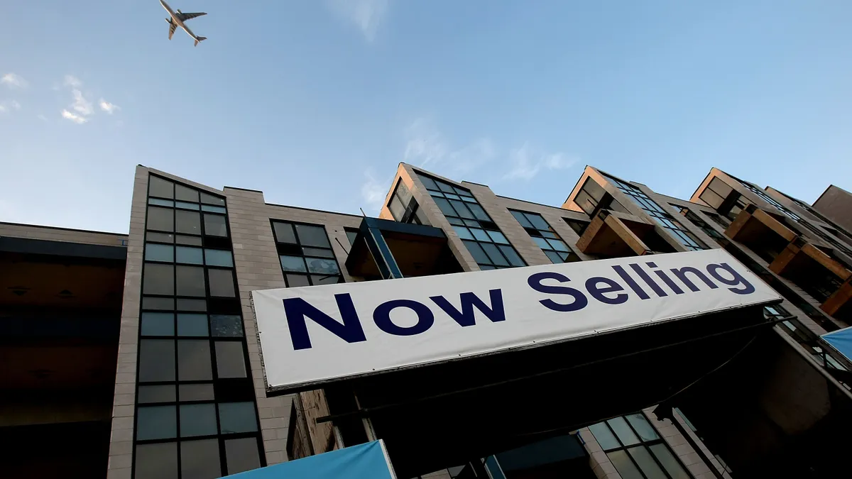 For sale sign on a commercial real estate building