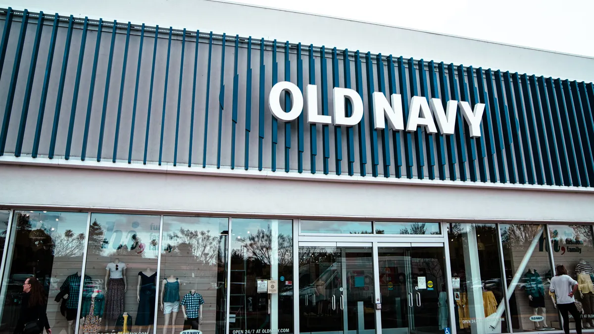 Mannequins in an Old Navy store window.