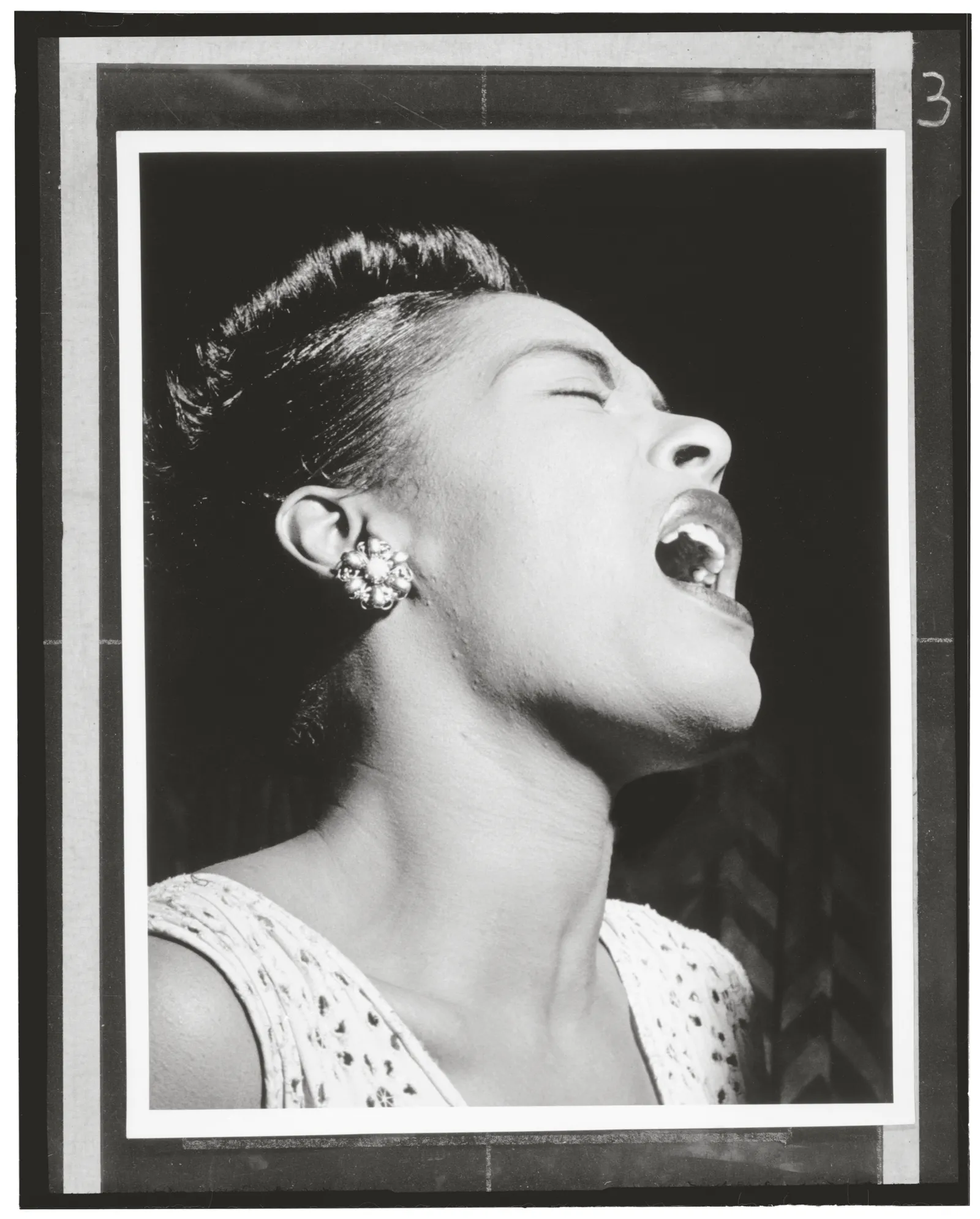 Billie Holiday performs at the Downbeat Club in a 1947 photograph by William Gottlieb, which is included in "Lady Day: Body & Soul." (Courtesy of Rocket 88 Books)