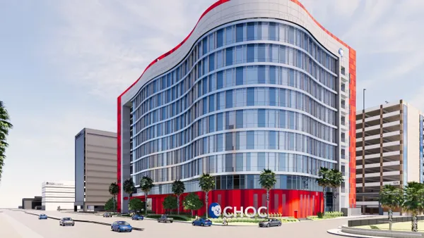 A rendering of a tall glass-covered building with "CHOC" emblazoned along the front on the ground floor.