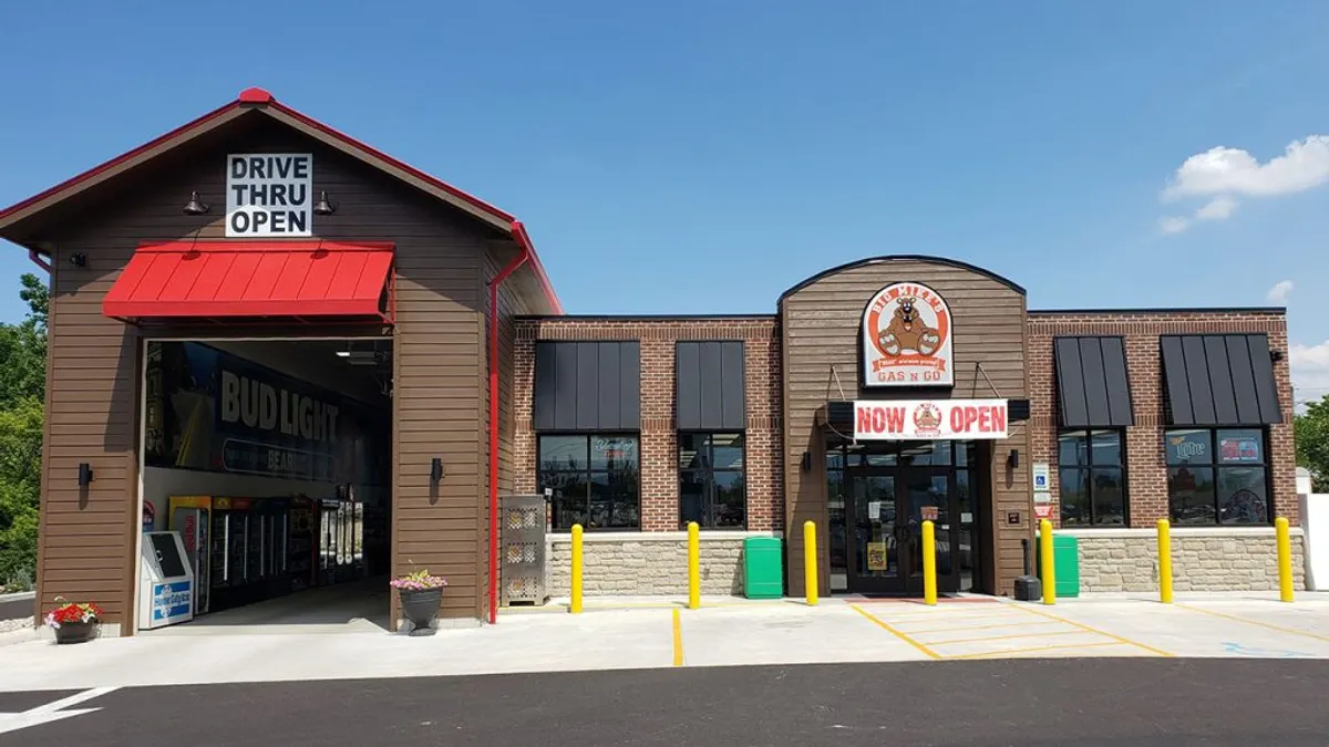 A photo of the exterior of a gas station and convenience store.