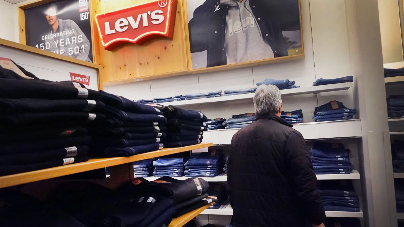 A customer browses Levi's jeans at a store in Chicago on Jan. 29, 2024.