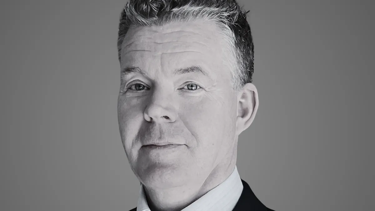 A headshot of Per Langoe, new CEO of GT Medical, wearing a suit jacket.