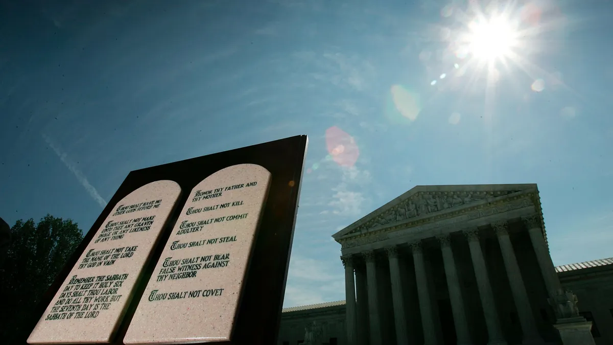 A display showing the Ten Commandments is seen outside in front of the U.S. Supreme Court building