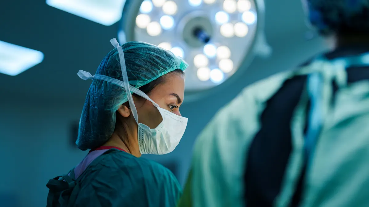 Surgeon and Nurses at Surgery Room