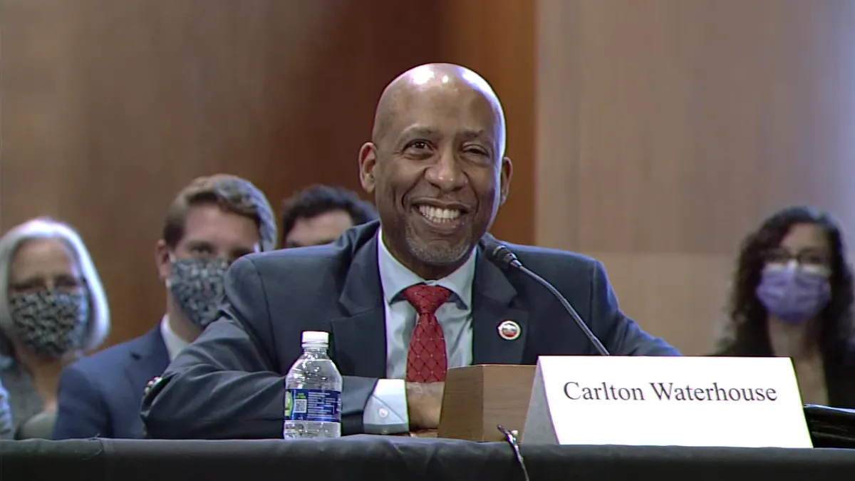 Carlton Waterhouse answers questions at a Senate confirmation hearing Sept. 15, 2021