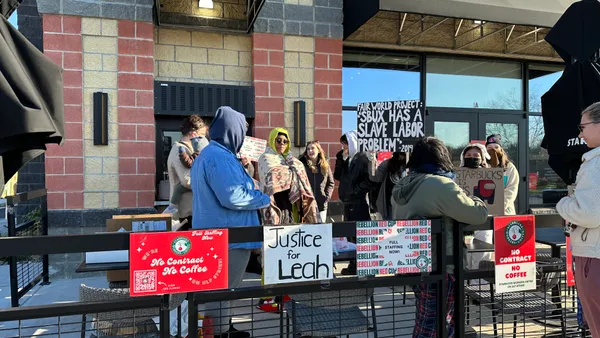 A photo of Starbucks workers participating in a strike in Nottingham, Maryland, Nov. 17, 2022