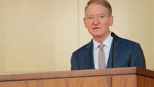 Securities and Exchange Commission Chairman Paul Atkins speaks at a lectern