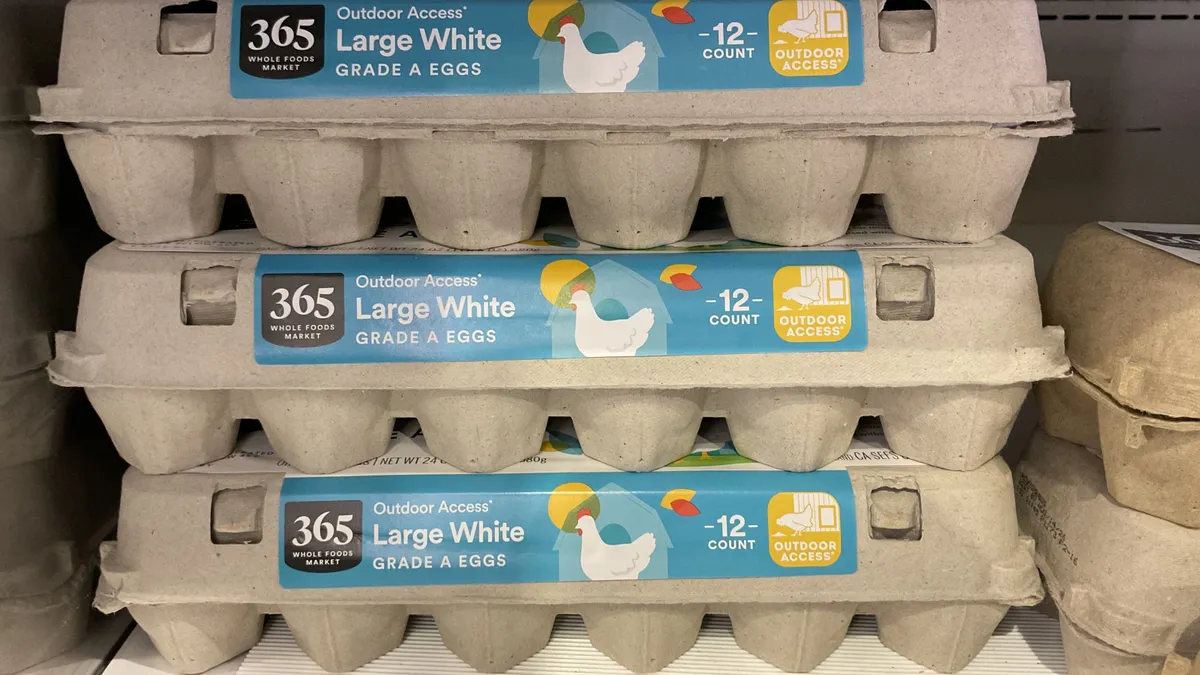 Cartons of eggs in a grocery store.