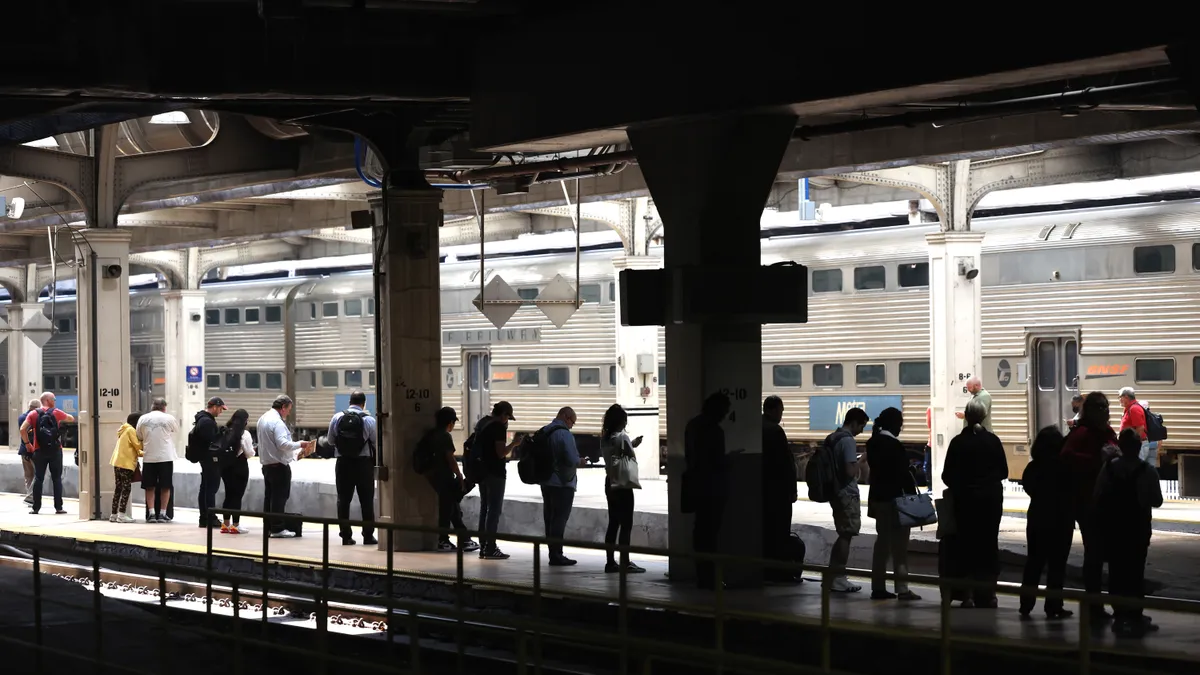 Passengers board a Metra commuter train at Union Station on September 15, 2022 in Chicago, Illinois.