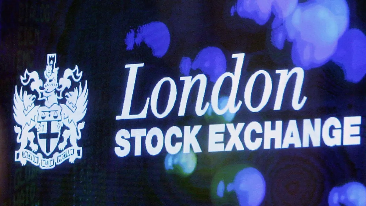 The logo of the London Stock Exchange is displayed in the foyer of the London Stock Exchange.