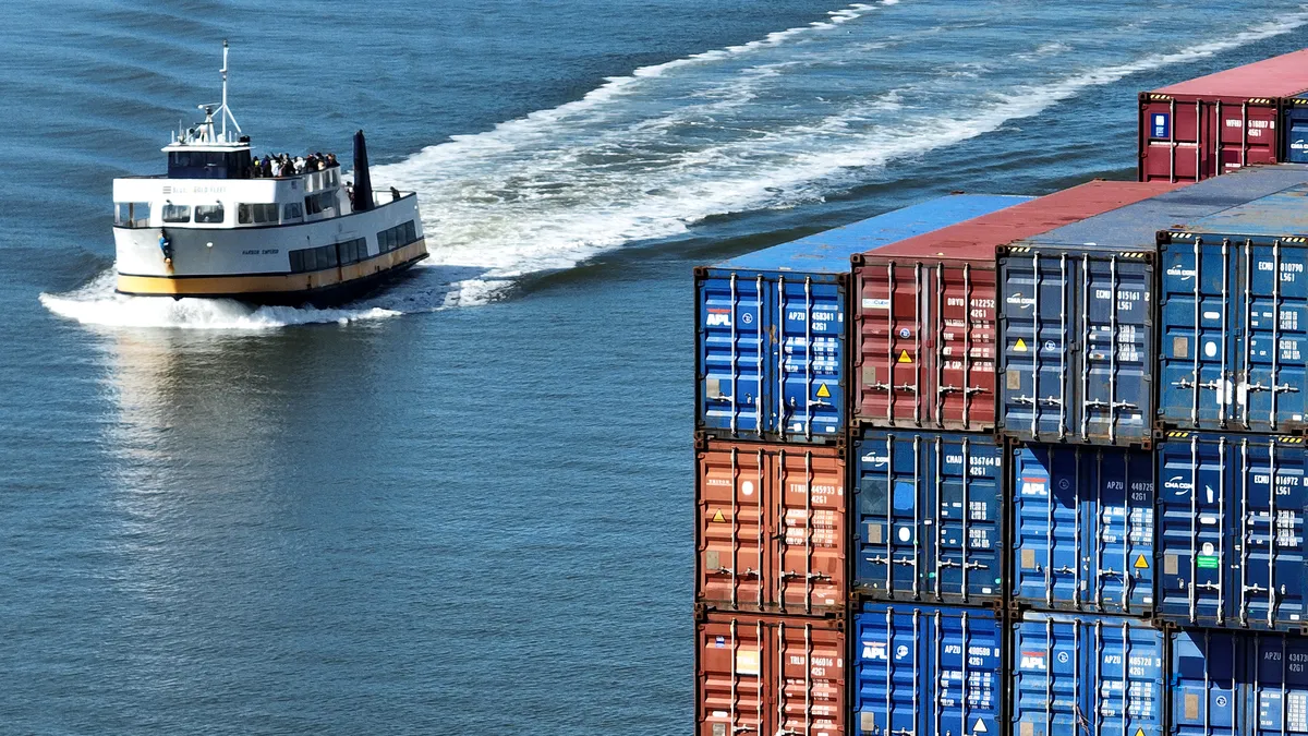 An aerial view of shipping containers on a ship docked at the Port of Oakland in Oakland, California.