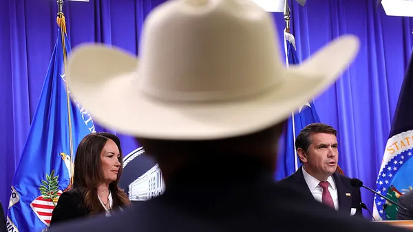 Acting U.S. Attorney General Todd Blanche, joined by Secretary of Agriculture Brooke Rollins, speaks at a press conference