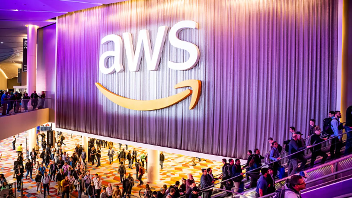 Attendees arrive during AWS re:Invent 2022, a conference hosted by Amazon Web Services, at The Venetian Las Vegas on November 29, 2022 in Las Vegas, Nevada.