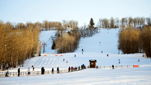 Skiers skiing down a hill in Wisconsin