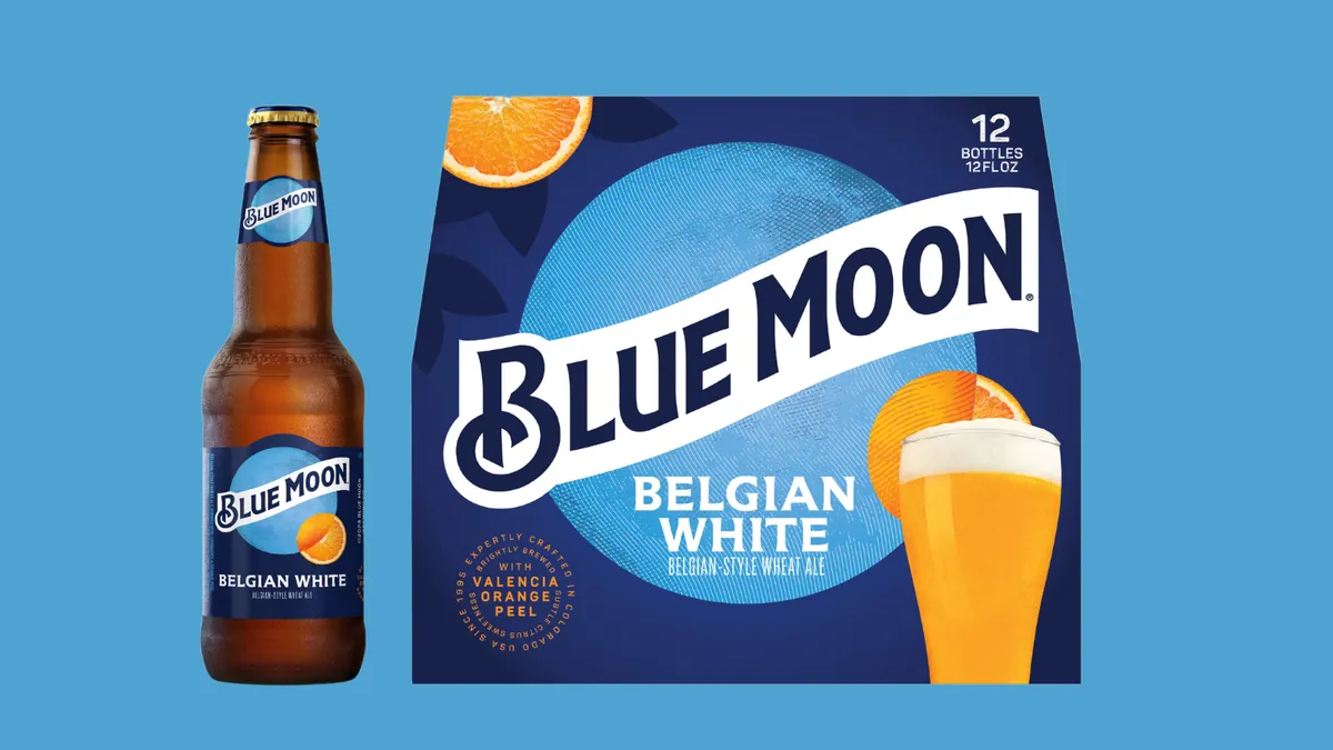 Blue Moon's new packaging with a bottle of Blue Moon off to one side.